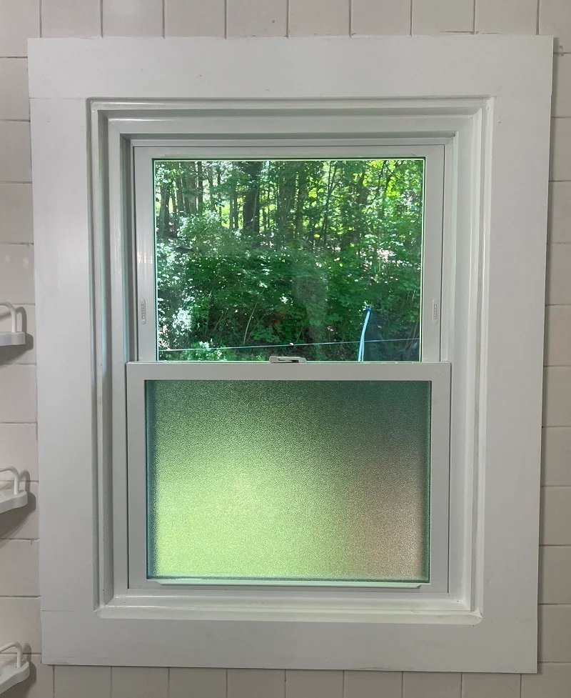 Tempered glass Harvey window in the bathroom