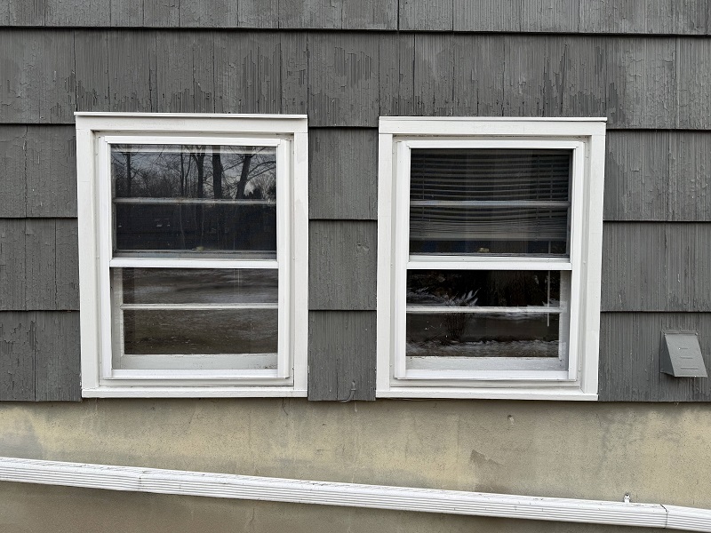 Two double hung windows to be converted into casements