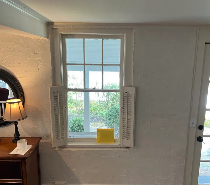 Windows with interior shutters