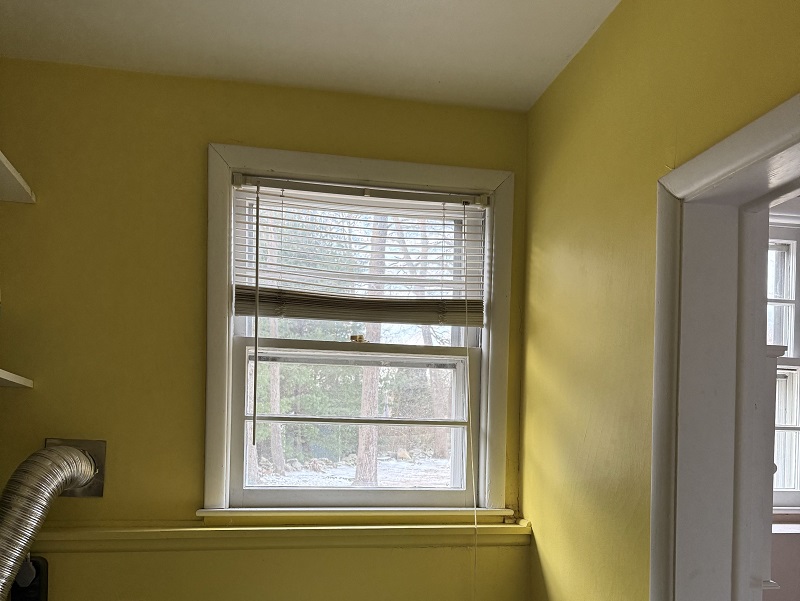 Old inefficient double hung window