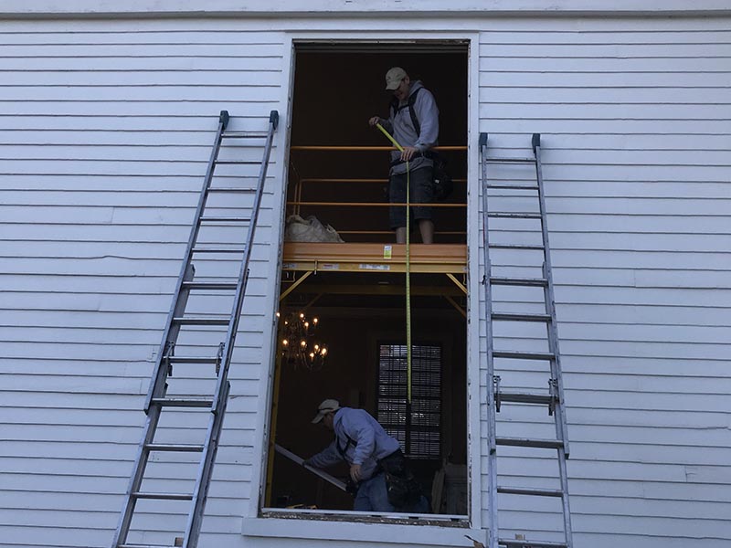 Window taller than 2 men 
