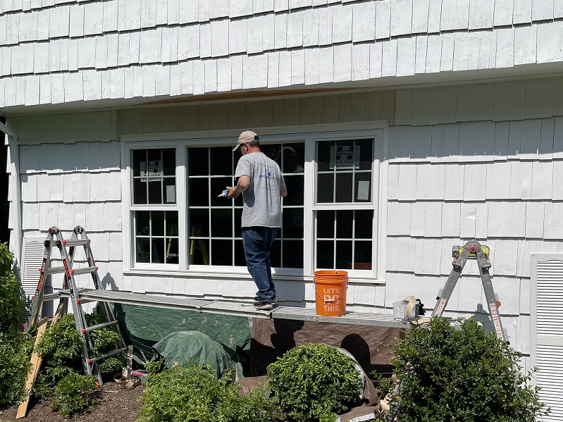 Bay window conversion to a combinat double hung picture window unit.