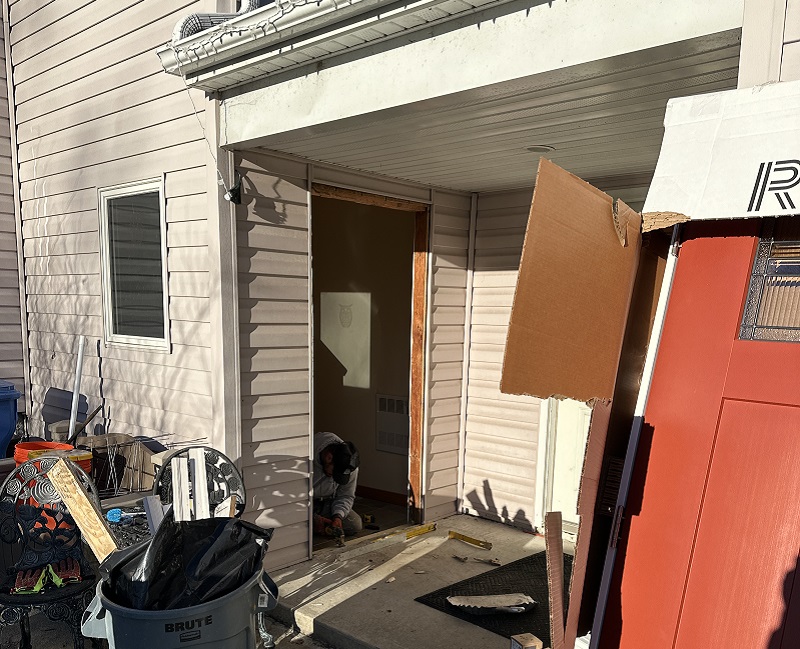 Working on the sill plate before door installation