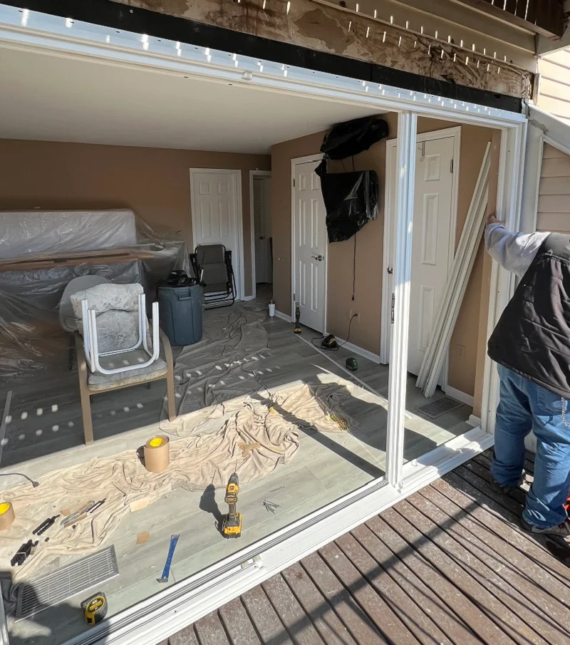 Window Solutions Plus installing a large patio door frame in Stamford, CT