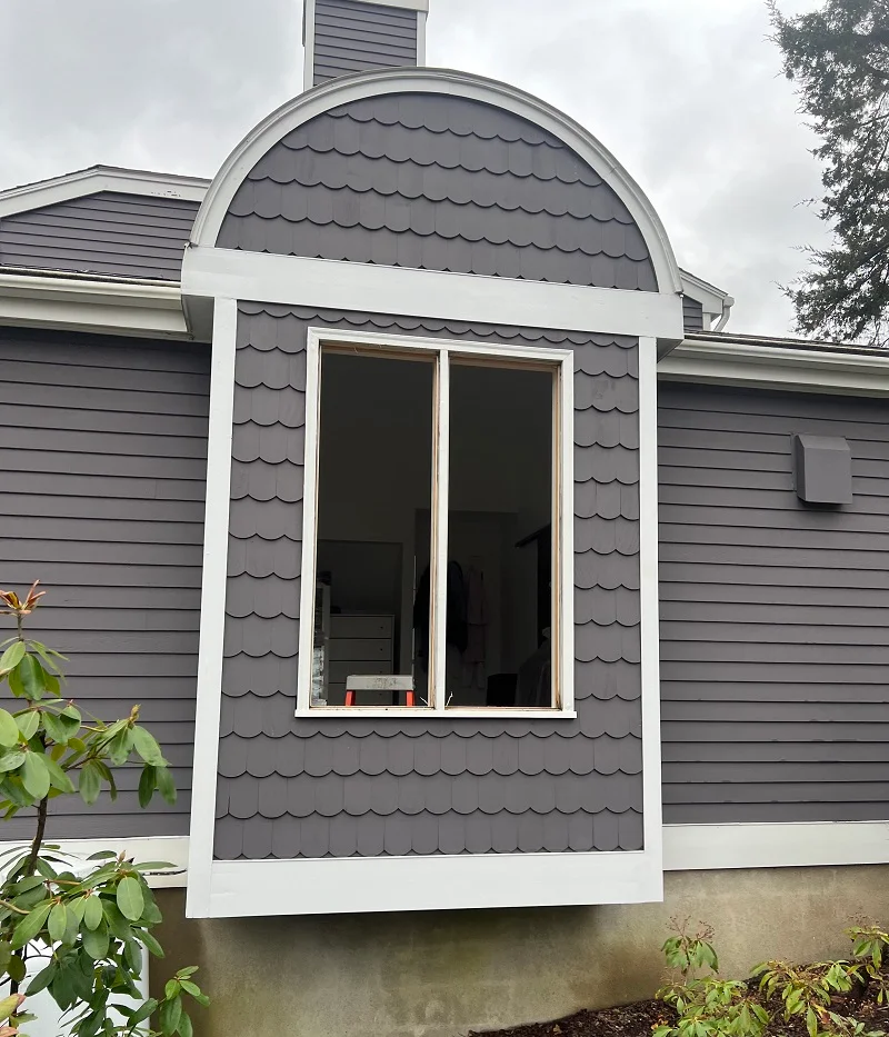 Window frame with sashes removed, new casement windows will be installed