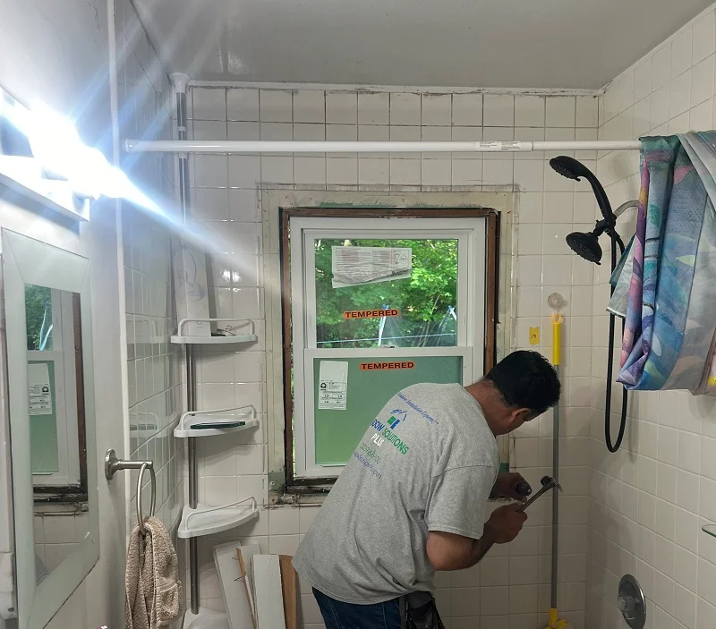 Window Solutions Plus master installer working on this bathroom window in Southbury, CT