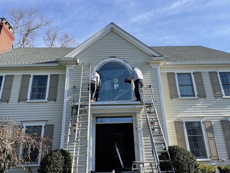 Suction cups help lift the window